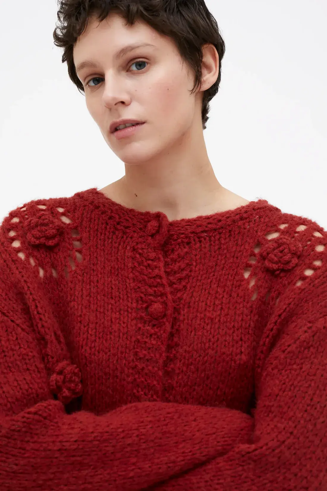 Wild Pony Red knit cardigan with crochet flowers